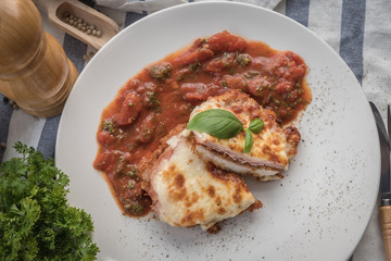 cooking healthy diet food in the home kitchen, Healthy Chicken parmesan