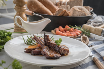 lamb steak on white plate