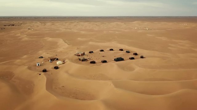 Flying over camping site in Sahara desert, Africa
