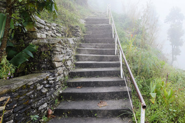Stairway up in the fog 