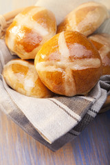 Hot cross buns on basket Top view, copy space. Easter baking