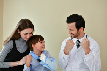 Health Concepts. The doctor is splinting to the patient. The doctor is examining a bone splint. Little children are happy in the healing of the doctor. Close-up image of a doctor