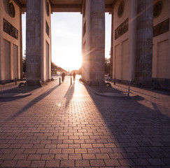 Sunset behind Brandenburg Gate in Berlin