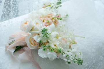 bouquet of roses on lace