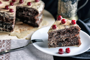 slice of chocolate cake with cherry berries