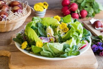 Spring salad with eggs and wild edible plants