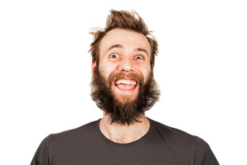 Young funny guy with beard laughs. Isolated on white.