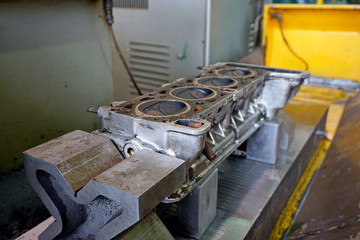 Grinding car head block on the machine. Clean and flat surface.