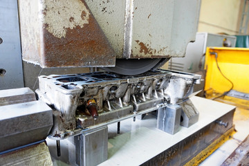 Grinding car head block on the machine. Clean and flat surface.