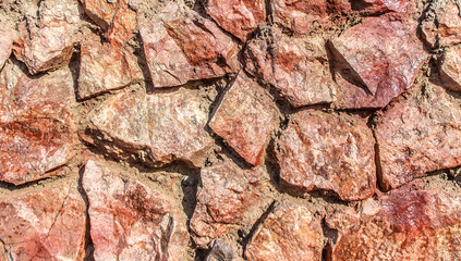Wall of granite stones