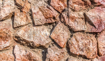 Wall of granite stones