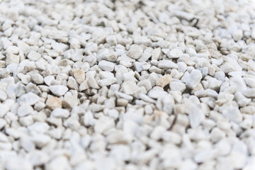 White stone wall texture and background, selective focus