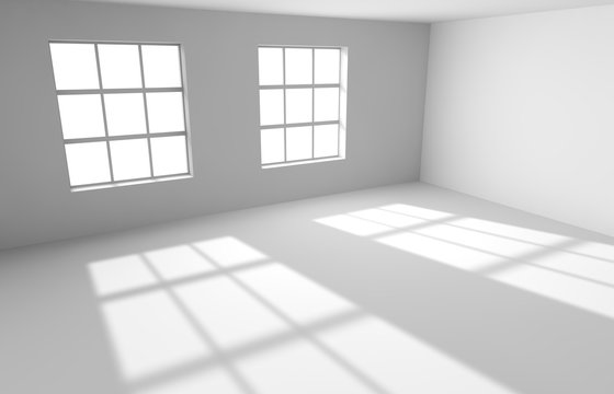 Empty white room with the lighted window