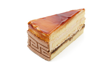 a piece of caramel cake on white background isolated