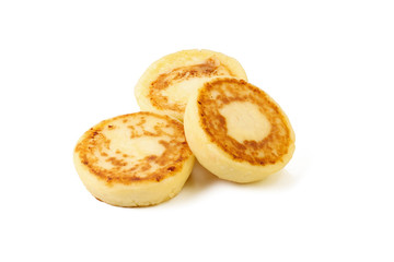 Fototapeta na wymiar cheese pancakes on white background isolated