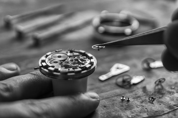 Process of installing a part on a mechanical watch, watch repair