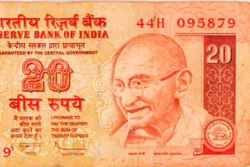 close-up 20 indian rupee frontside with Mahatma Gandhi. Background