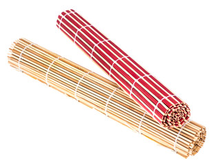 Bamboo mats of different colors on white background