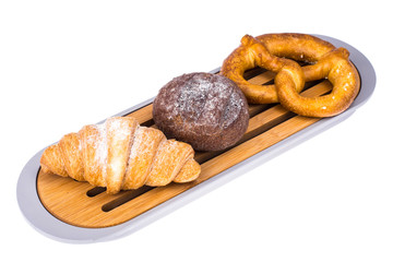 Wooden cutting board for bread on white background