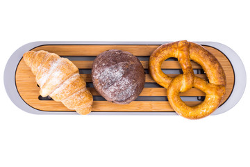 Wooden cutting board for bread on white background
