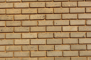 Yellow brick wall. Background and texture