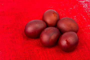 Red painted eggs as symbol of the holiday of Easter