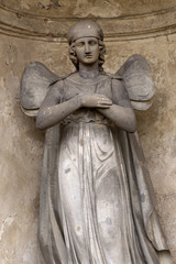 Fototapeta na wymiar Historic Sculpture from the mystery old Prague Cemetery, Czech Republic