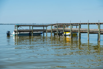 Dock on the river with boats