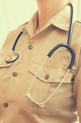 Doctor woman with a stethoscope in special medical clothes.