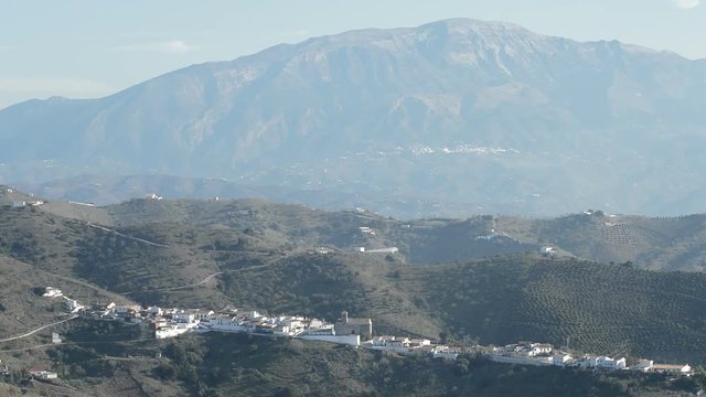 Landscape of Benaque, native town of the Spanish poet, Salvador Rueda, between mountains a sunny day