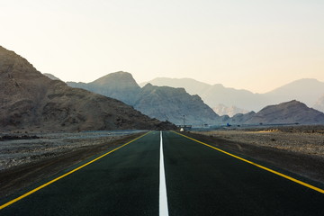 Empty mountain road through the dessert mountain on Jabal Jais