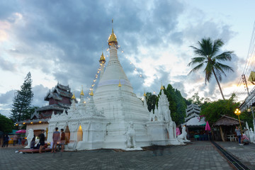 Fototapeta premium landscape view of Wat Phra that Doi Kong mu pagoda when the sunset and twilight sky. Mae hong son, thailand tourism.