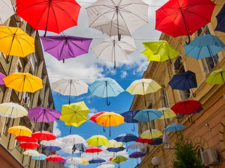 Fototapeta na wymiar Umbrellas falling from the sky 