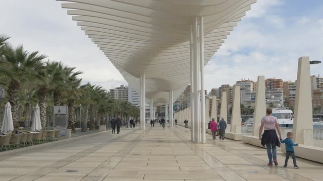 Tourists walking on Muelle Uno Passage