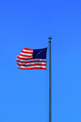 american usa flag on pole