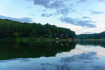 Obraz na płótnie Canvas panorama landscape view of big lake with blue sky and cloud at Pang Ung,Mae Hong Son,Thailand