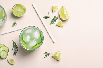 Composition with tasty lemonade on light background, top view