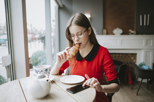 Girl having breakfast