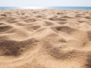 Beautiful sand beach pattern background. Brown sandy texture