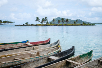 Naklejka na ściany i meble wooden boats, canoe boat - Guna Yala, San Blas Islands -