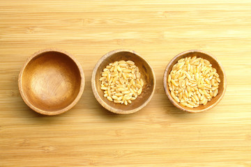 Empty Half and Full Wheat Cups