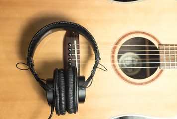 Headphones Over Acoustic Guitar