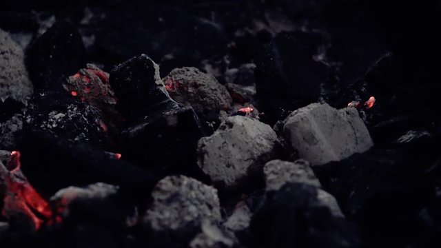 Smoldering coals in the grill 