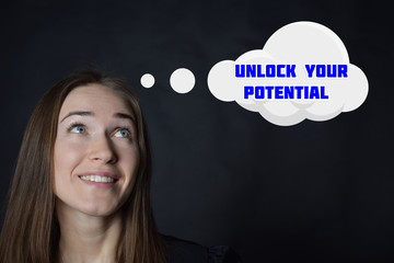 Above the businessman hangs a cloud with the inscription:UNLOCK YOUR POTENTIAL