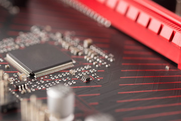 Circuit board with resistors microchips and electronic components.