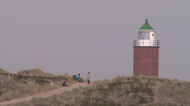 Lighthouse on Sylt island, Germany. Leuchtturm am Strand von Sylt.