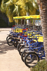 Fototapeta na wymiar Tricycles for rent.