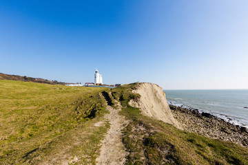 Fototapeta na wymiar St Catherine's Lighthouse on Isle of Wight at Watershoot Bay in England