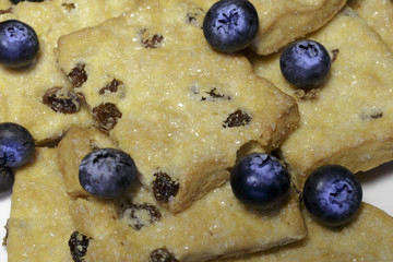Shortbread cookies with blueberries as the concept of Breakfast. Tasty background.