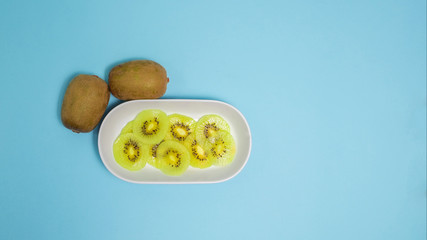 Kiwi fruit on color background.